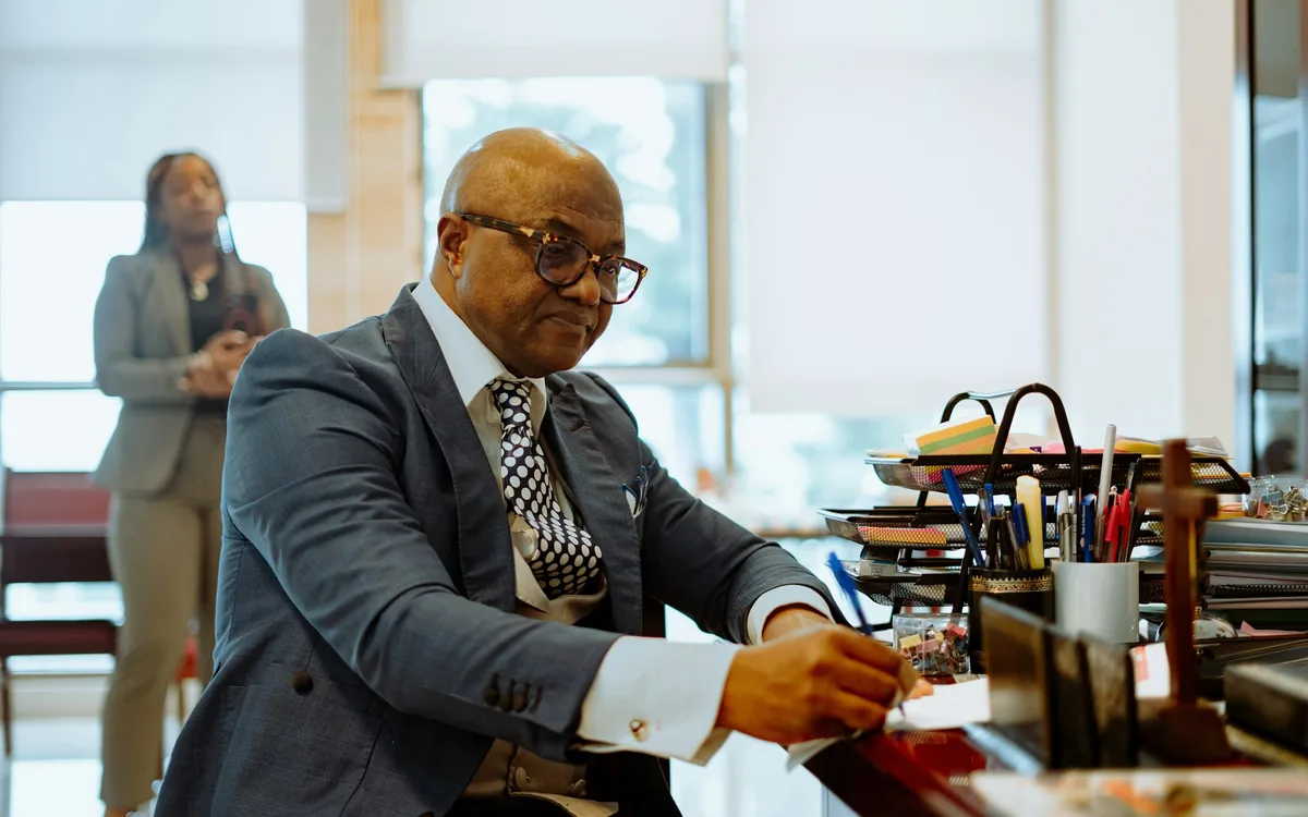 Lawyer reviewing files at his desk
